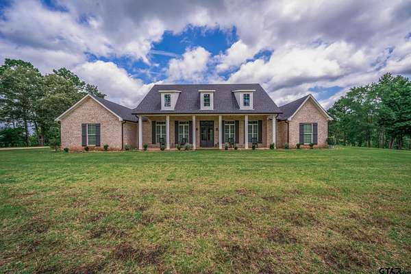 5 Acres of Land with Home for Sale in Jacksonville, Texas