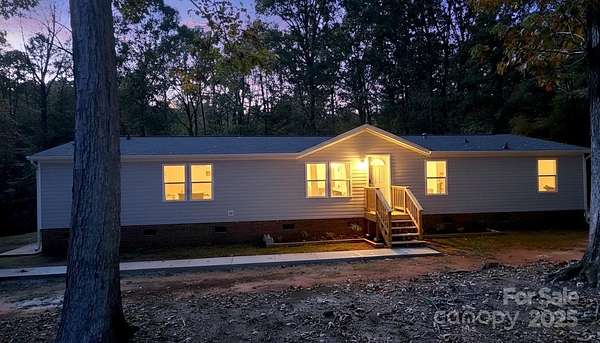 2.5 Acres of Residential Land with Home for Sale in Mount Holly, North Carolina