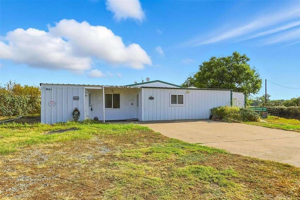 12.3 Acres of Land with Home for Sale in Weatherford, Texas