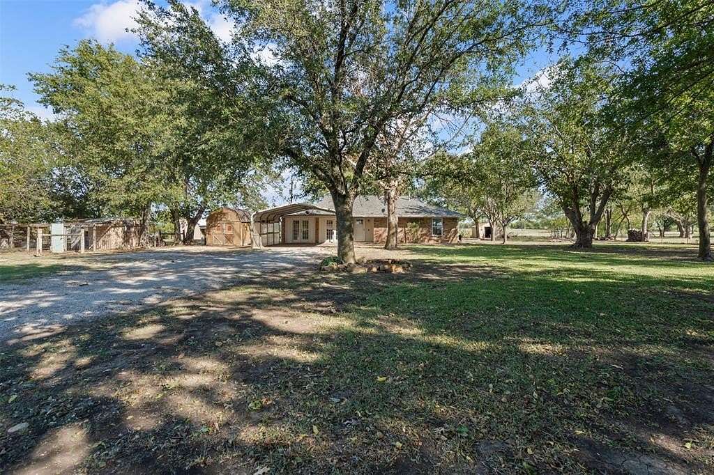 5 Acres of Land with Home for Sale in Justin, Texas