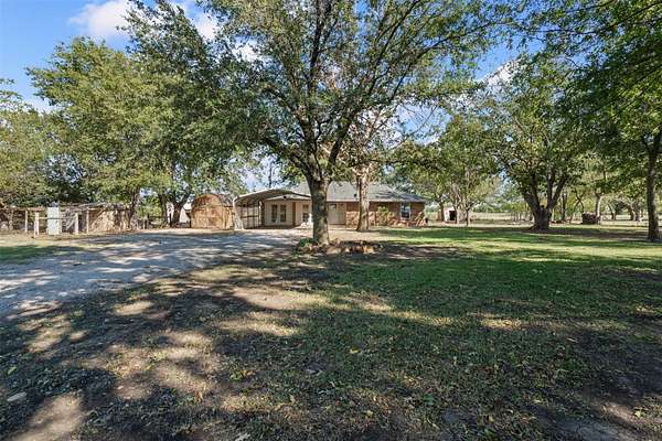 5 Acres of Land with Home for Sale in Justin, Texas