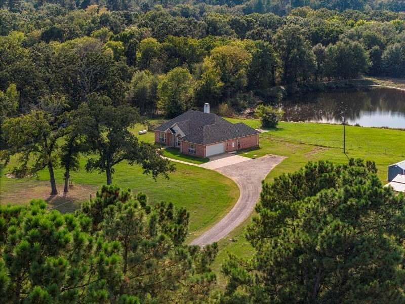 17.7 Acres of Recreational Land with Home for Sale in Athens, Texas