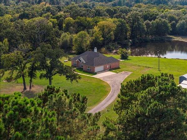 17.7 Acres of Recreational Land with Home for Sale in Athens, Texas