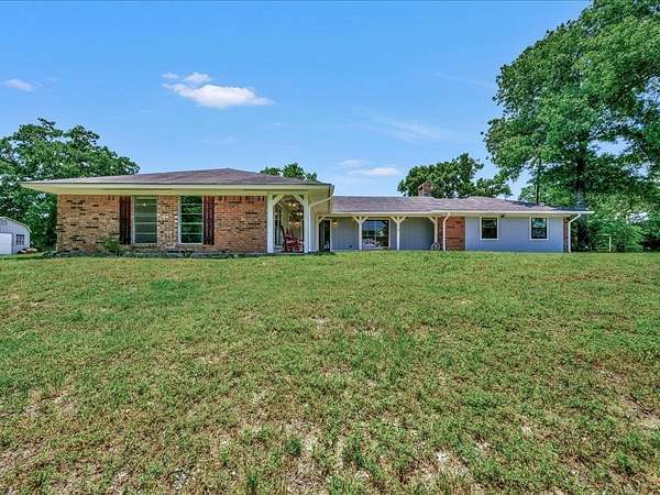 14 Acres of Land with Home for Sale in Garrison, Texas