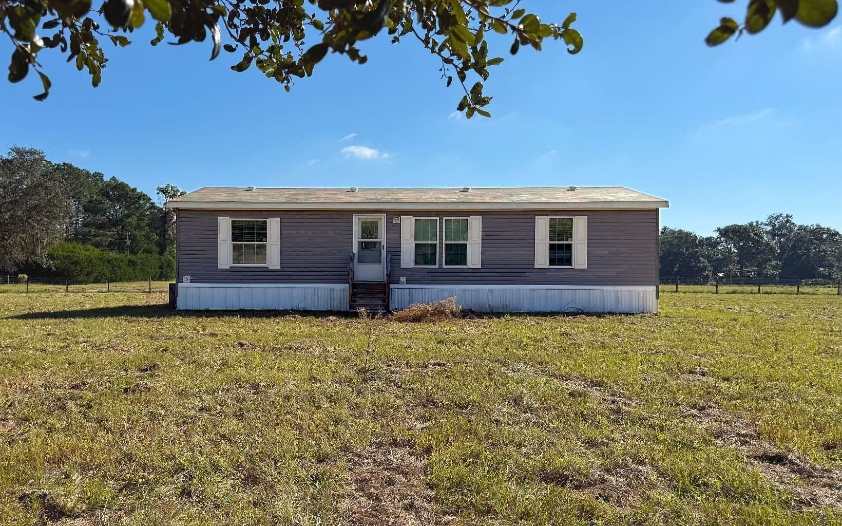 9.73 Acres of Land with Home for Sale in Chiefland, Florida