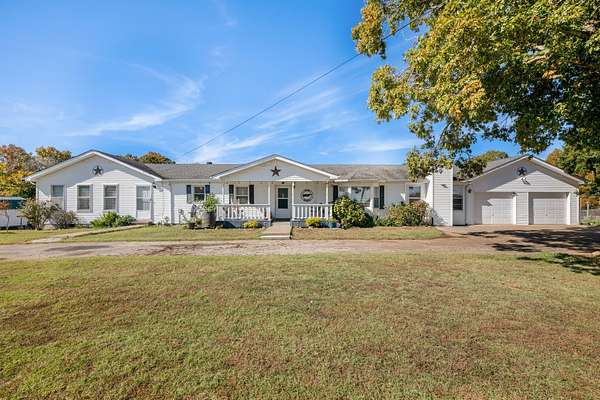 5 Acres of Residential Land with Home for Sale in McEwen, Tennessee