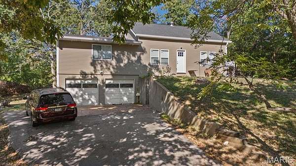 7.22 Acres of Land with Home for Sale in Arnold, Missouri