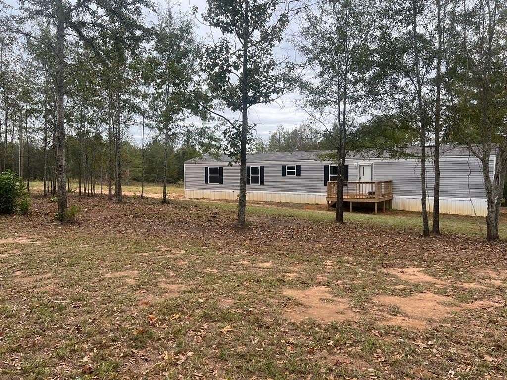 1.15 Acres of Residential Land with Home for Sale in Highland Home, Alabama