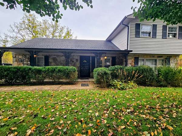 1.77 Acres of Residential Land with Home for Sale in Palmer, Tennessee