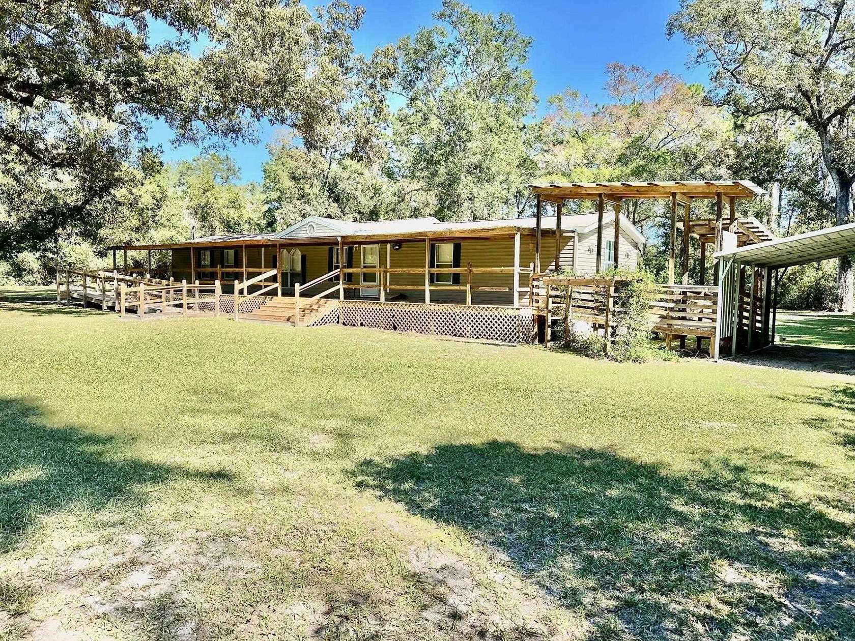 2 Acres of Residential Land with Home for Sale in Crawfordville, Florida