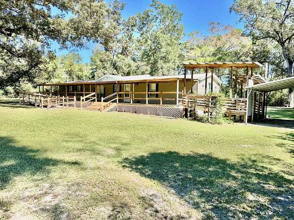 2 Acres of Residential Land with Home for Sale in Crawfordville, Florida