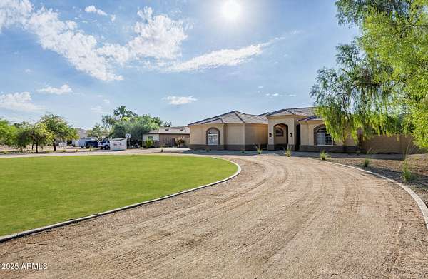 2 Acres of Residential Land with Home for Sale in Waddell, Arizona