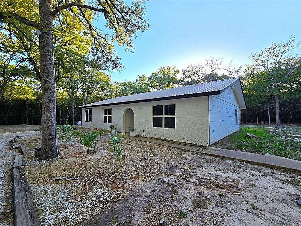 2.22 Acres of Land with Home for Sale in Quinlan, Texas