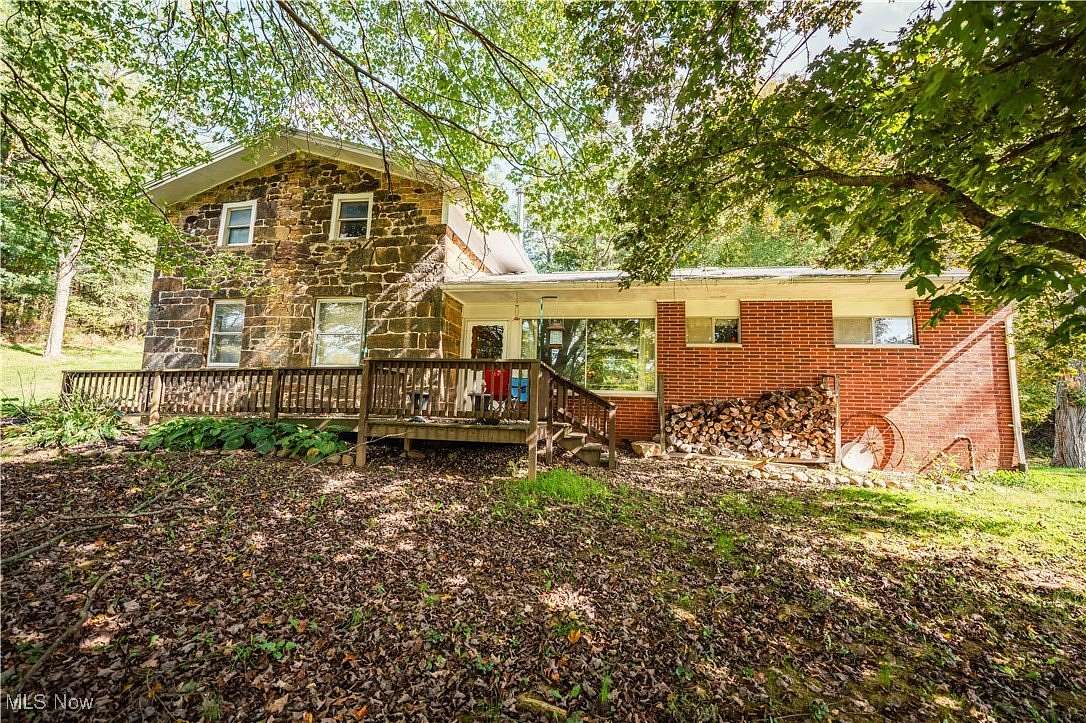 73.9 Acres of Land with Home for Auction in Lucas, Ohio