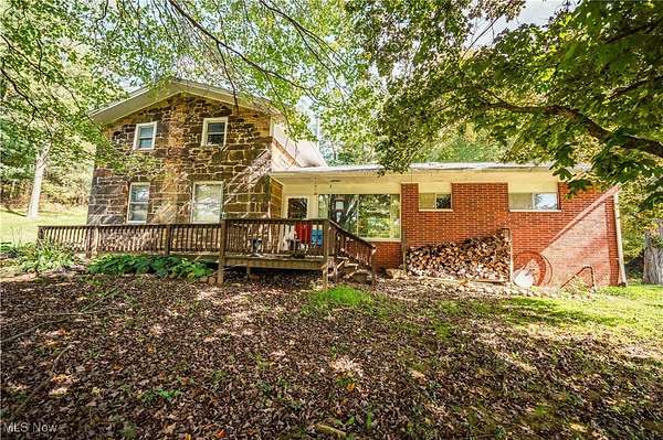 73.9 Acres of Land with Home for Auction in Lucas, Ohio