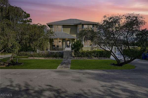 6.5 Acres of Land with Home for Sale in North Fort Myers, Florida