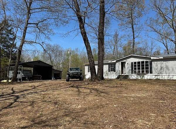 20 Acres of Land with Home for Sale in Big Sandy, Tennessee