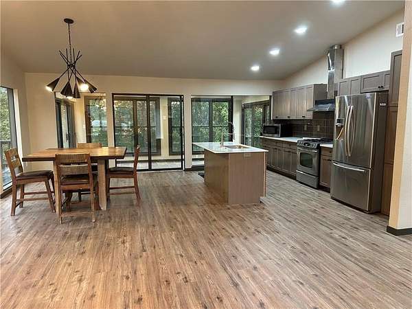 12 Acres of Recreational Land with Home for Sale in Rogers, Arkansas