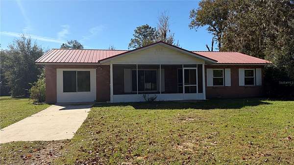 2.6 Acres of Residential Land with Home for Sale in Archer, Florida