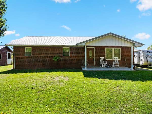 105 Acres of Land with Home for Sale in Scottown, Ohio