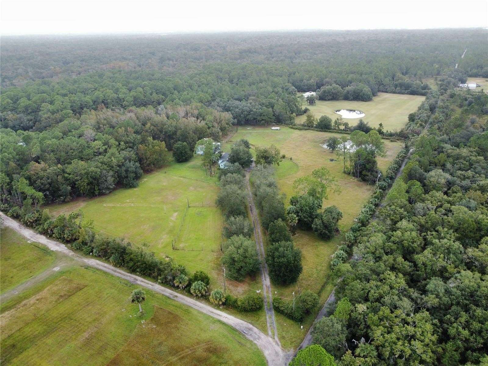 10 Acres of Land with Home for Sale in Osteen, Florida