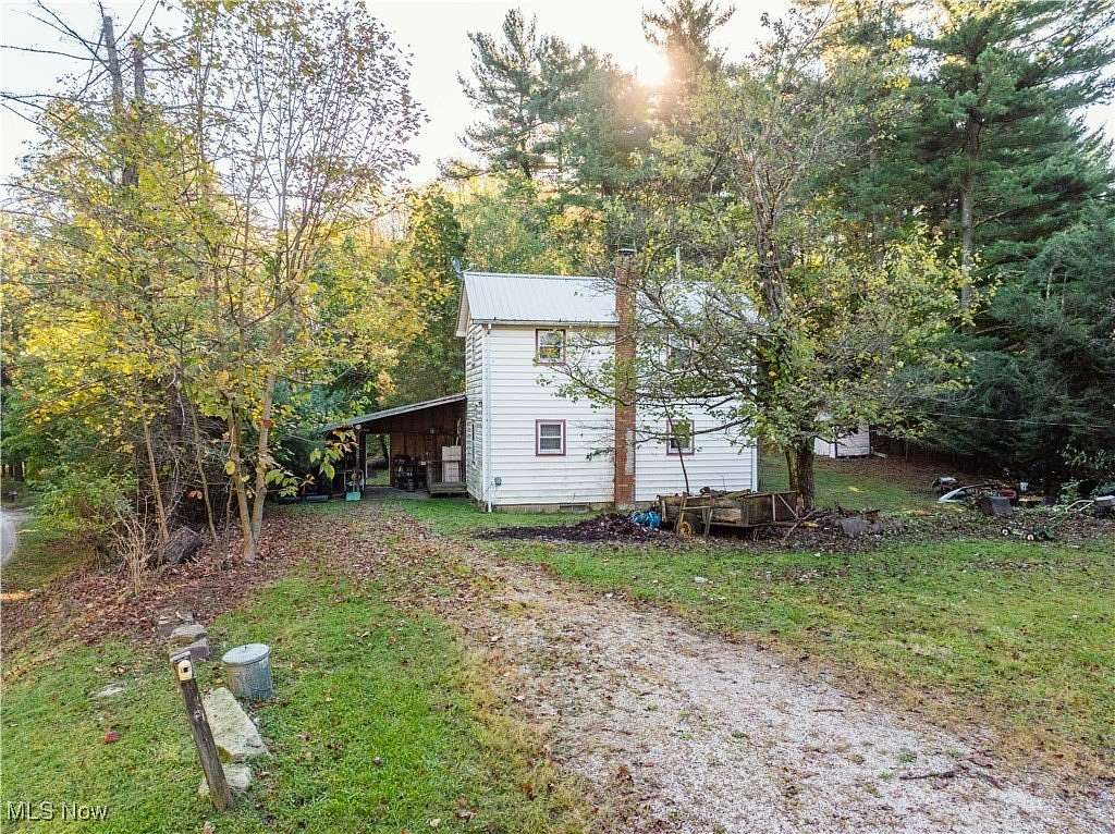 40.2 Acres of Recreational Land with Home for Auction in New Philadelphia, Ohio