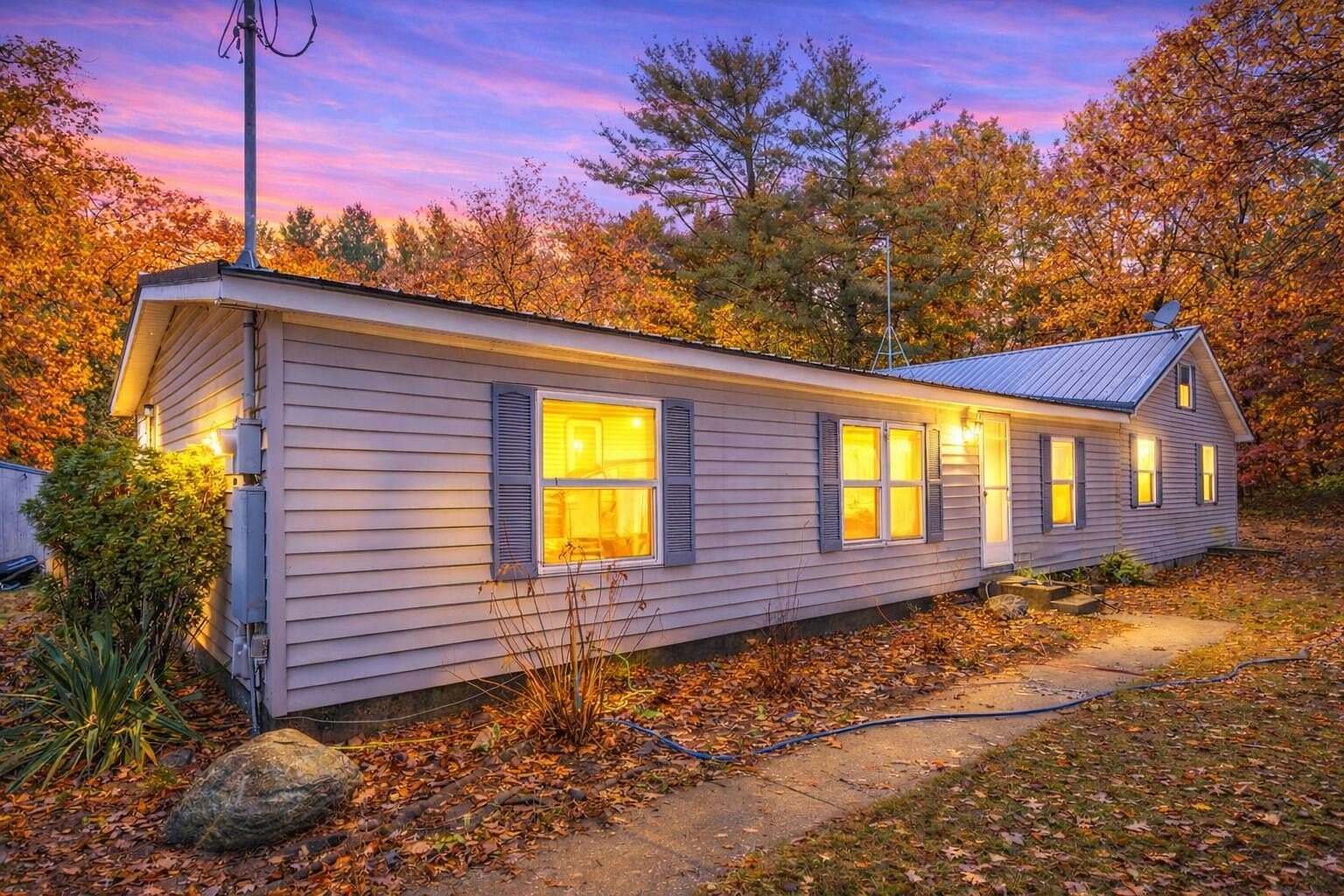 4.8 Acres of Residential Land with Home for Sale in Howard City, Michigan