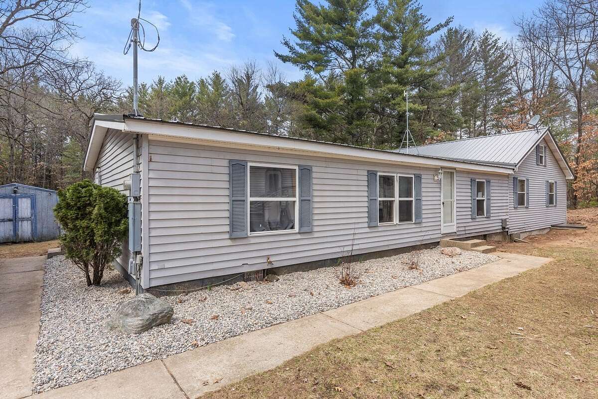 4.8 Acres of Land with Home for Sale in Howard City, Michigan