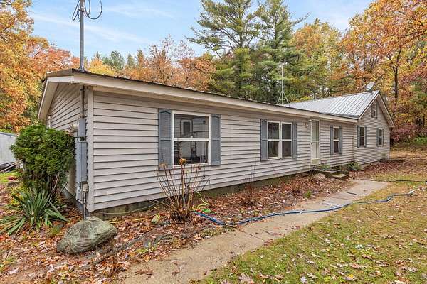 4.8 Acres of Residential Land with Home for Sale in Howard City, Michigan