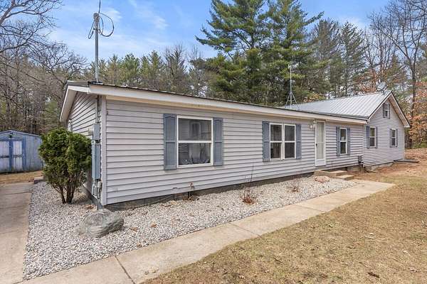 4.8 Acres of Land with Home for Sale in Howard City, Michigan