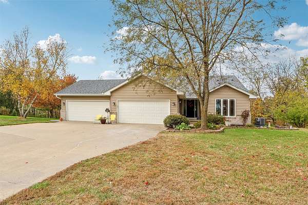 4.67 Acres of Residential Land with Home for Sale in Indianola, Iowa