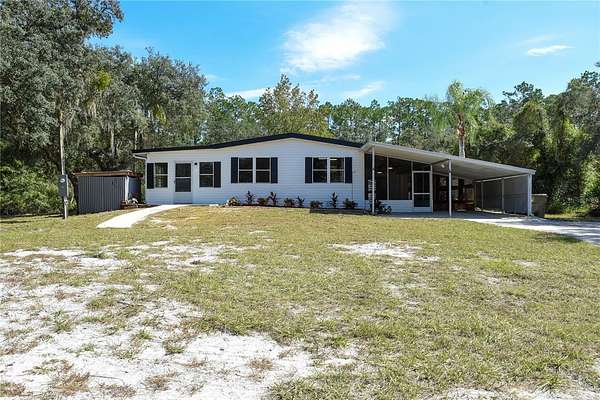 1.74 Acres of Residential Land with Home for Sale in Paisley, Florida
