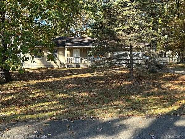 1.79 Acres of Residential Land with Home for Sale in Pinckney, Michigan