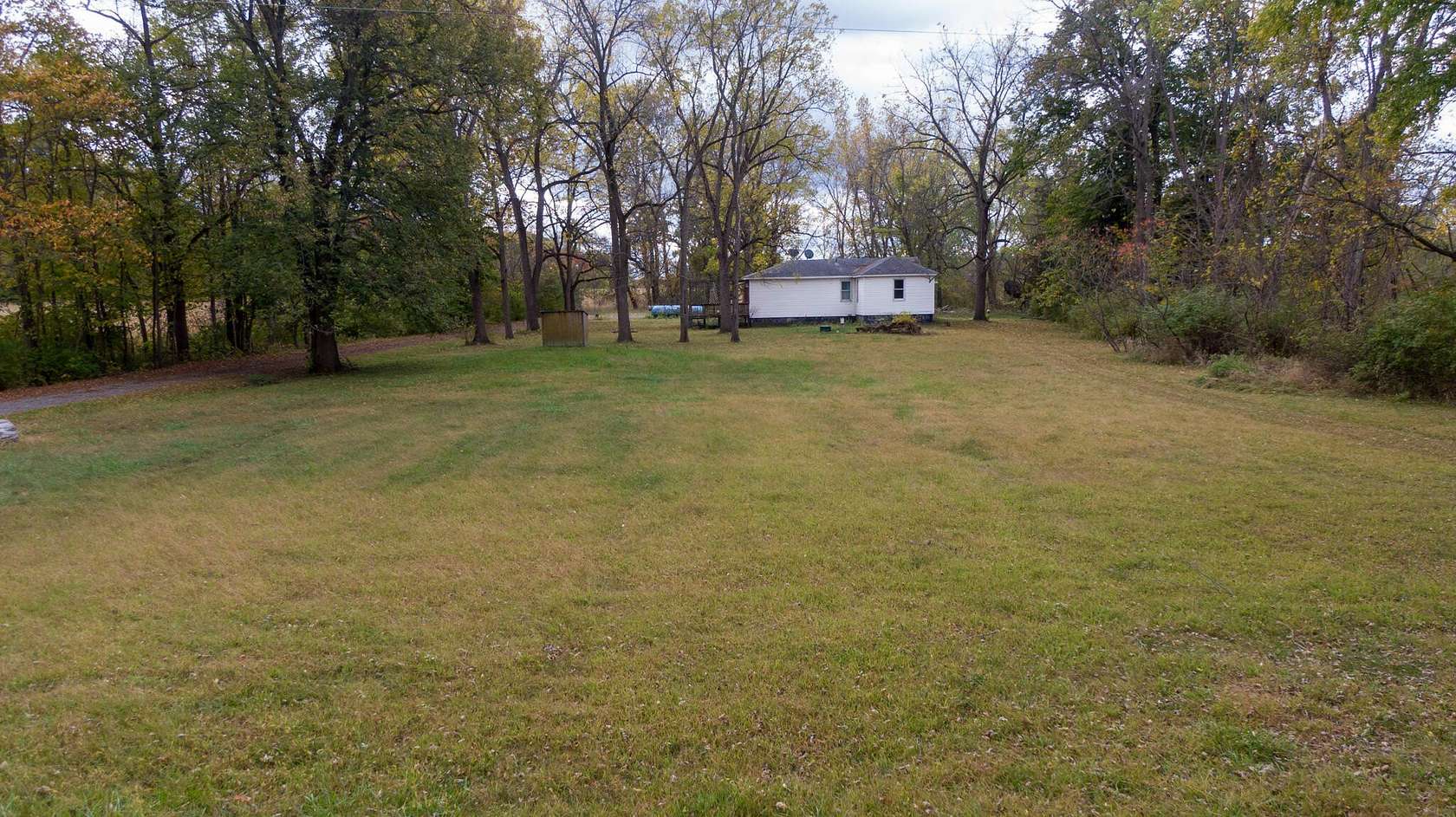 9.4 Acres of Residential Land with Home for Sale in New Buffalo, Michigan