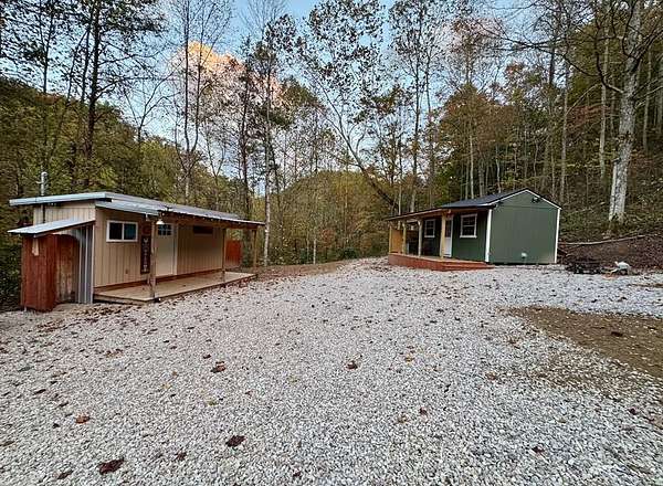 14.4 Acres of Land with Home for Sale in Blaine, Kentucky