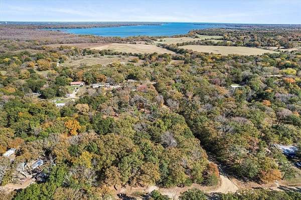 1.58 Acres of Residential Land with Home for Sale in Quinlan, Texas