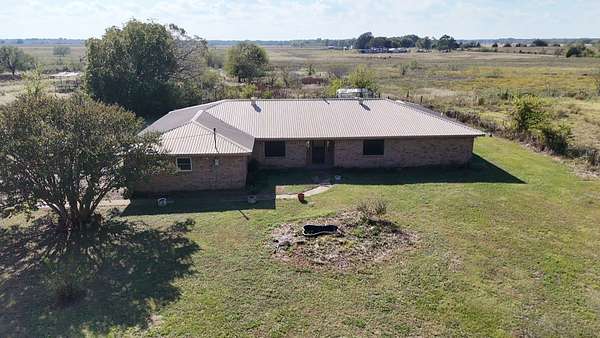 2.75 Acres of Land with Home for Sale in Powell, Texas