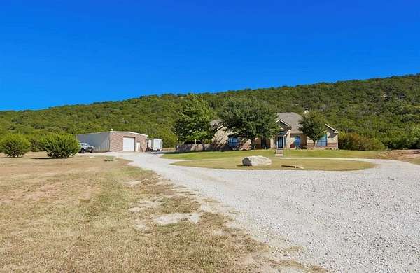25.6 Acres of Land with Home for Sale in Tuscola, Texas