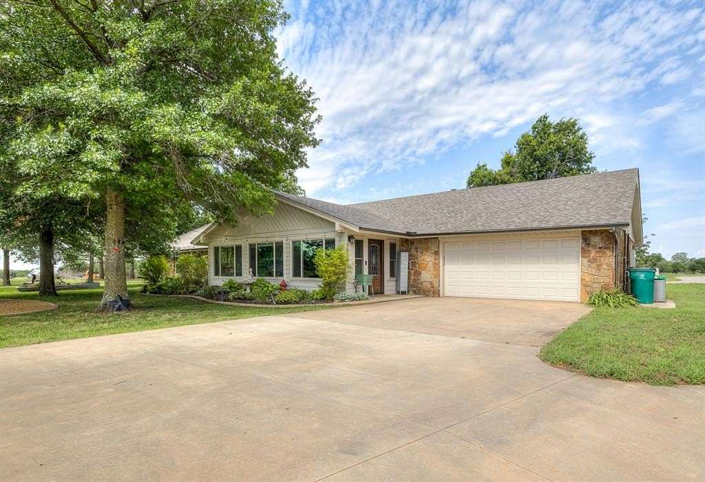 5.48 Acres of Land with Home for Sale in Yukon, Oklahoma