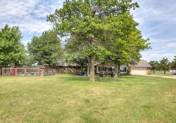 5.48 Acres of Land with Home for Sale in Yukon, Oklahoma