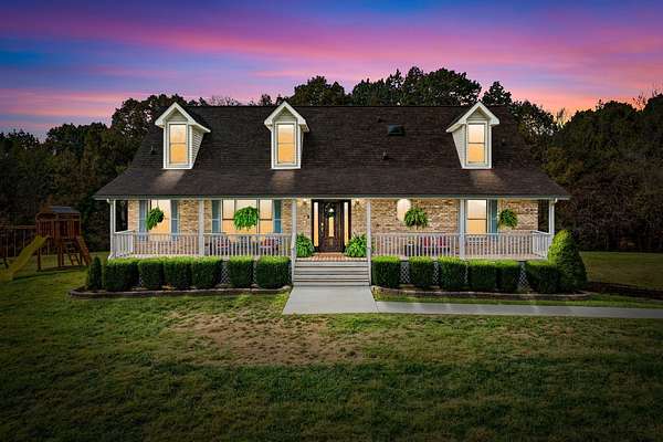 5 Acres of Residential Land with Home for Sale in Cunningham, Tennessee