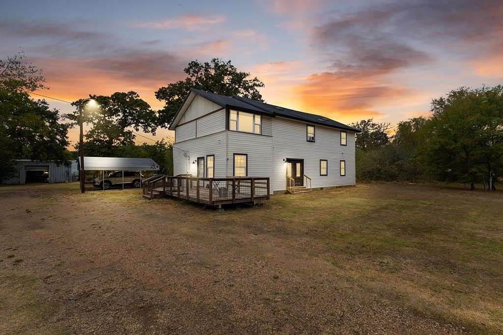 4.76 Acres of Residential Land with Home for Sale in Scurry, Texas