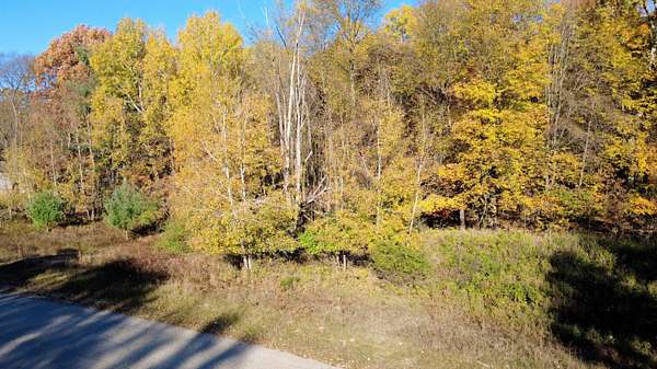 1.45 Acres of Residential Land for Sale in Canadian Lakes, Michigan