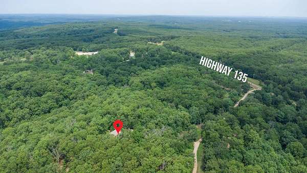 5.59 Acres of Residential Land with Home for Sale in Gravois Mills, Missouri