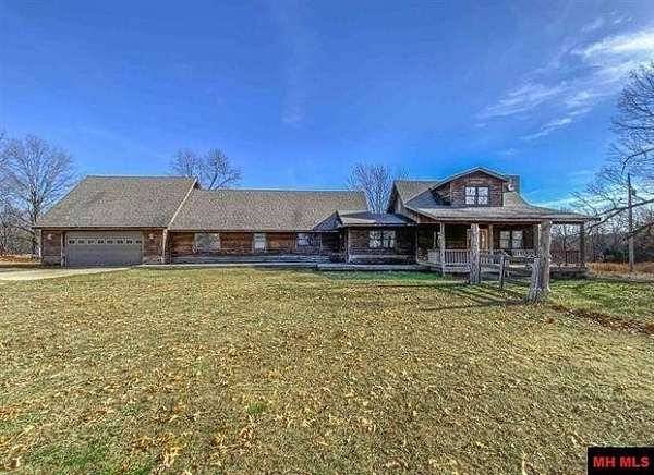 21.1 Acres of Agricultural Land with Home for Sale in Valley Springs, Arkansas