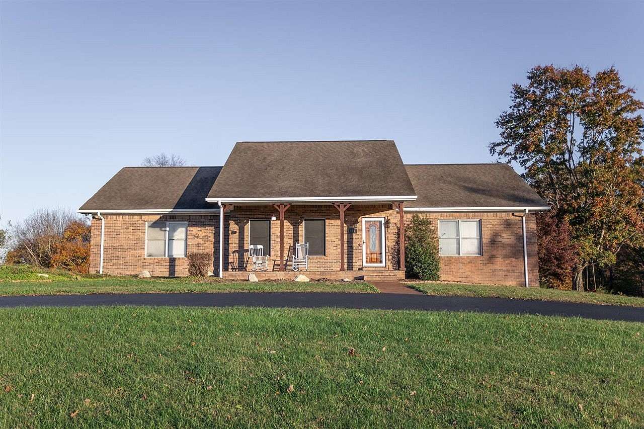 7.6 Acres of Land with Home for Sale in Scottsville, Kentucky