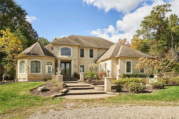 4.5 Acres of Residential Land with Home for Sale in Norton, Ohio