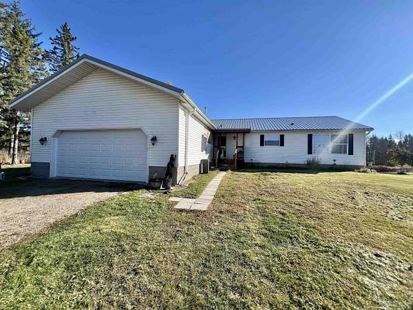 40 Acres of Recreational Land with Home for Sale in Rock, Michigan