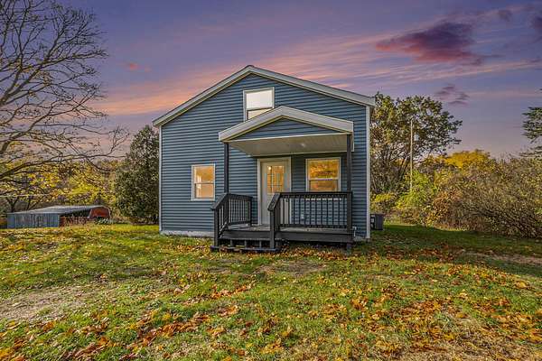 1.2 Acres of Residential Land with Home for Sale in Saranac, Michigan