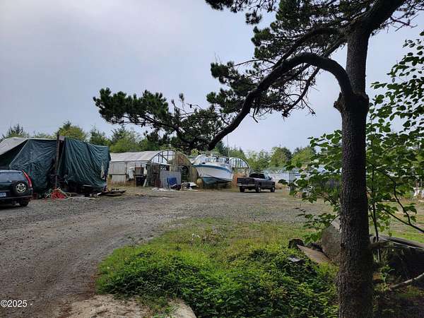 9.72 Acres of Residential Land with Home for Sale in Waldport, Oregon